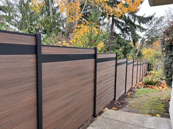 Home with composite fence with trees