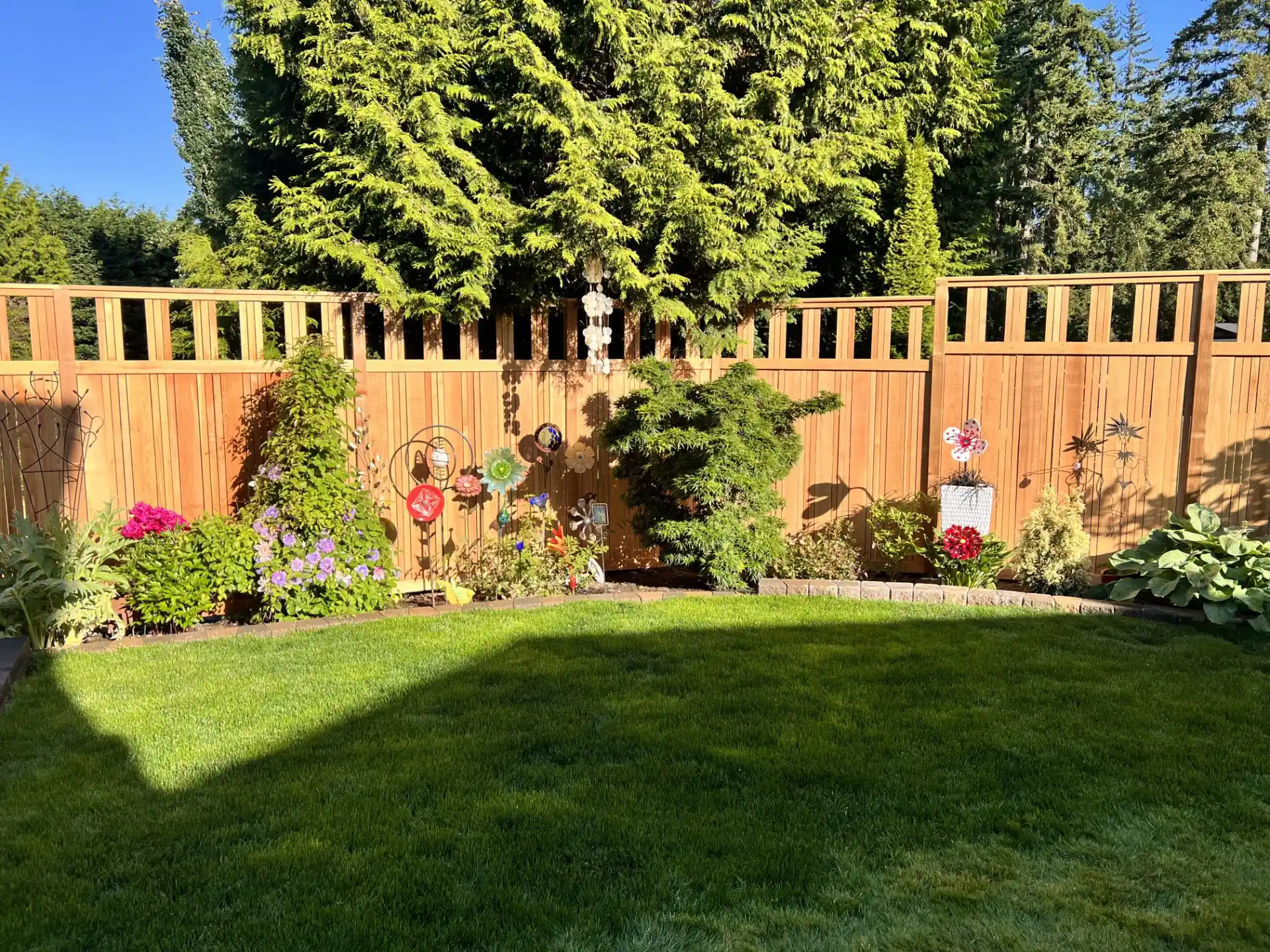 Sunny Edmonds Yard with Wood Fence